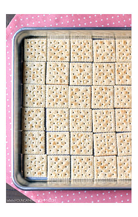 Line A Rimmed Baking Sheet With Rows Of Saltine Crackers The Rimmed