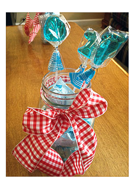 Yellow Plates Blue Forks Red Napkins And Green Cups Were Used Front