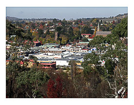 Armidale from the sentry in mid autumn. Note the spires of the Anglican and Catholic cathedrals and old Teacher's College building on hill. New South Wales.