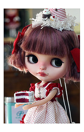 She Take A Small Red Velvet Cake In Hands.decorated With Cherry
