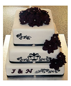 BITE ME CUPCAKES And WRAPPERS STYLISH AND ELEGANT WEDDING CAKE