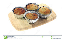 Four Fresh Baked Blueberry Muffins On Cutting Board