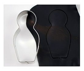 Nesting Doll Cookie Cutter To Cut Out A Shape. Lightly Brush A Cookie
