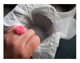 Take The Glass Out And Flatten The Parchment Paper Some More Against