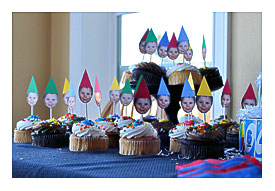 Little Max's Face In A Birthday Hat Made Up The Cupcake Toppers