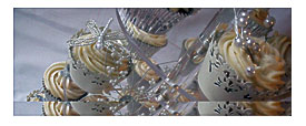 Chocolate Cupcakes In Silver Cupcake Cases And Ivory Cupcake Wrappers